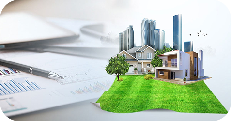 Model homes and a city skyline on green land beside property planning documents